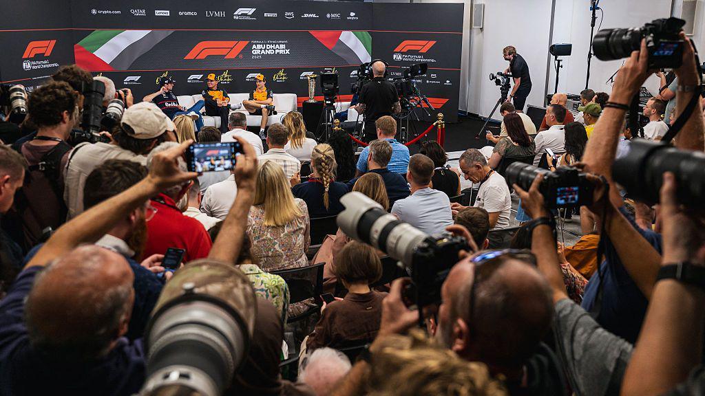 Max Verstappen, Lando Norris and Oscar Piastri sit in a packed news conference before the Abu Dhabi Grand Prix