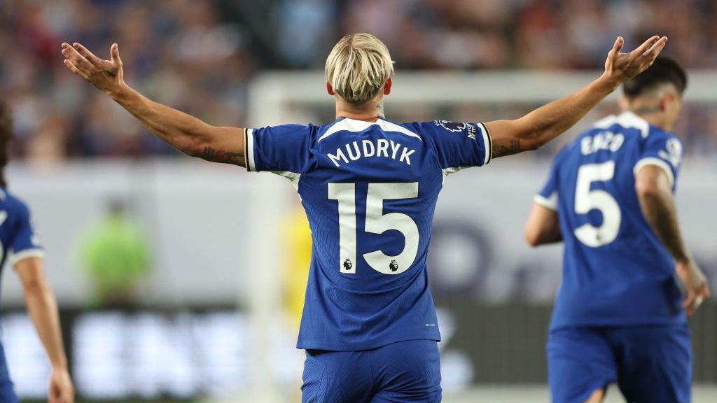 Mykhailo Mudryk celebrates after scoring a goal for Chelsea in the Premier League