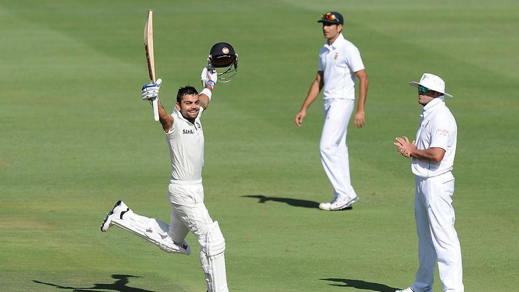 India's Virat Kohli walks back to the pavilion after his dismissal during the first day of the second cricket Test match between South Africa and India at Newlands stadium in Cape Town on January 3, 2024.