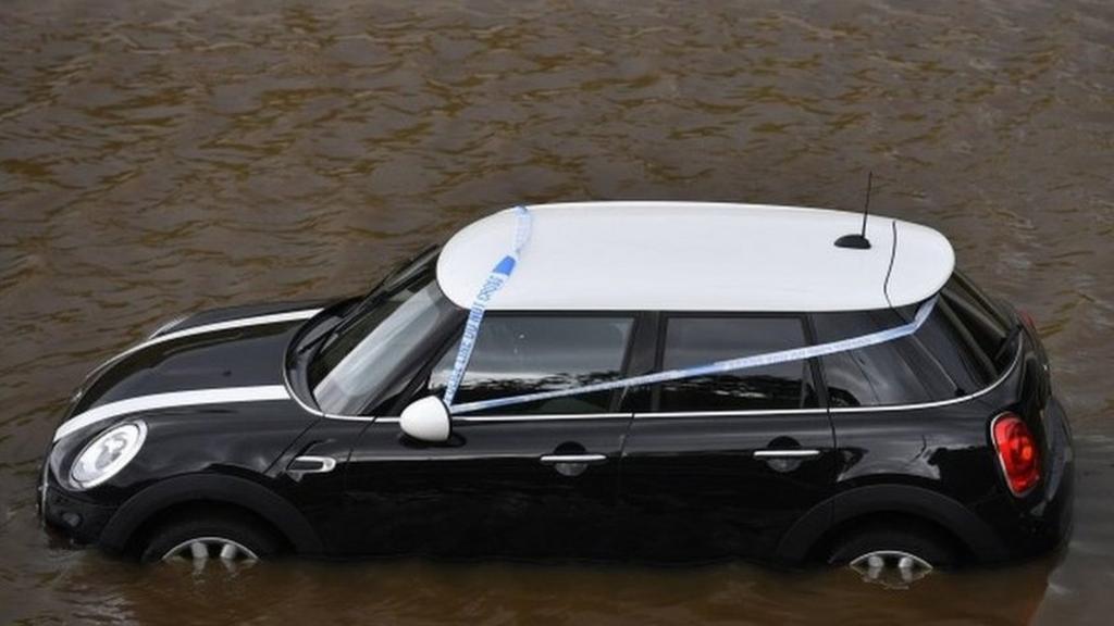 A car stranded in flood water