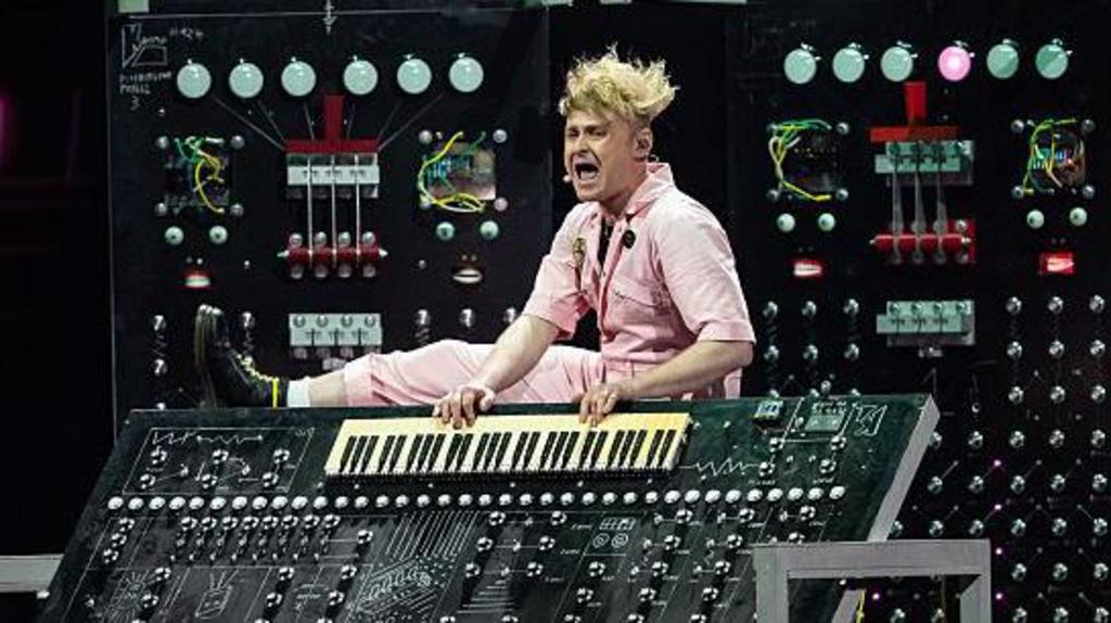 English musician Sam Battle, aka Look Mum No Computer performs with his leg on a piano during a dress rehearsal for the second semi-final of the Eurovision Song Contest 2026.