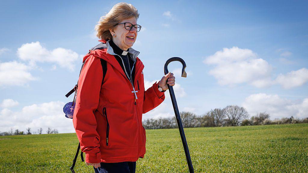 Dame Sarah Mullally walking on her pilgrimage.