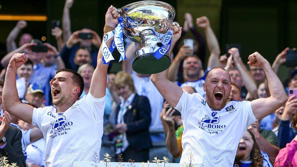 Monaghan’s Niall Garland and Kevin Crawley lift the Lory Meagher Cup