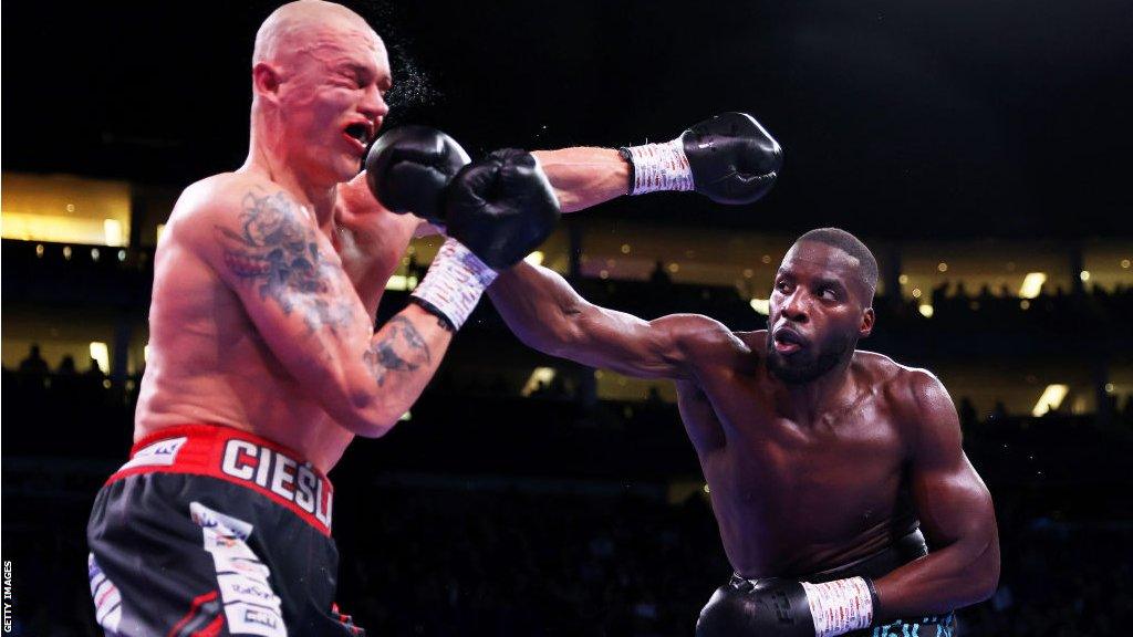 Lawrence Okolie throws a right jab in his fight against Michal Cieslak in February 2022