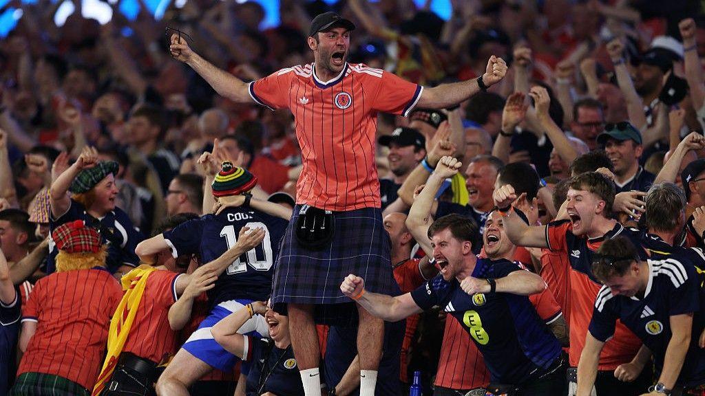  Fans of Scotland celebrate as John McGinn #7 (not pictured) of Scotland scores his team's first goal during the FIFA World Cup 2026 Group C match between Haiti and Scotland 