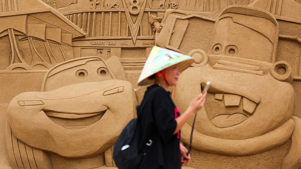 Sand art of Disney’s Cars characters