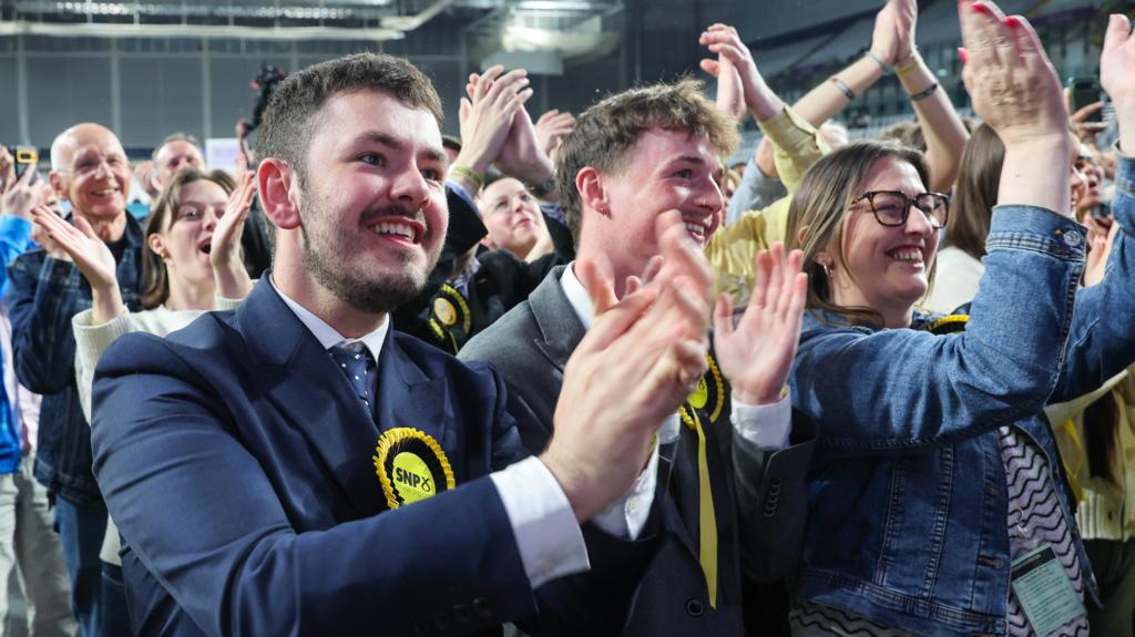 SNP supporters celebrating at a count