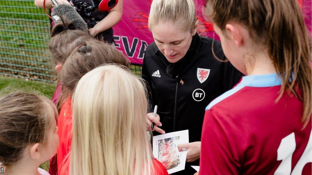 Gemma Grainger signing autographs at a Huddle session in Llanelli