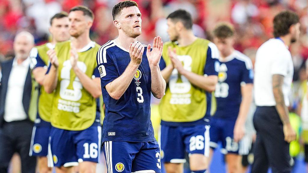 Andy Robertson applauds after Scotland's loss to Morocco