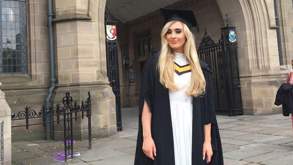 Rhiannon Dixon graduation photo outside Manchester University