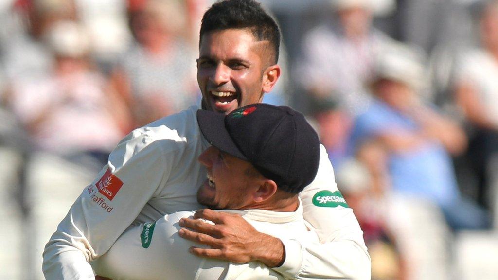 Lancashire's Keshav Maharaj celebrates the wicket that clinched a tie at Taunton