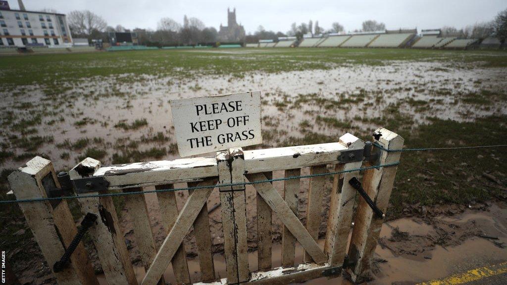 Flooded cricket pitch