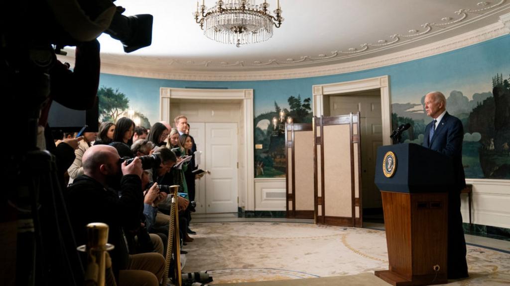 Joe Biden addresses members of the media in the White House