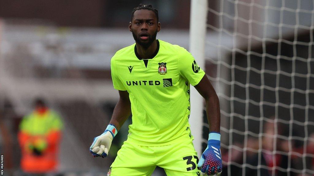 Arthur Okonkwo: Wrexham's on-loan Arsenal goalkeeper to have surgery on jaw  - BBC Sport