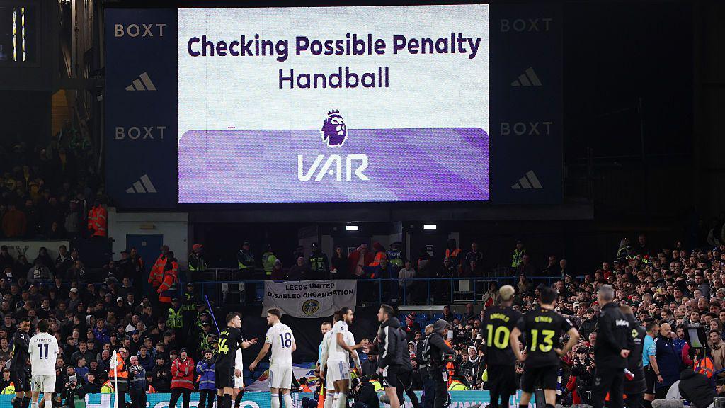The LED board shows the VAR check for a penalty which is given by referee Stuart Attwell during the Premier League match between Leeds United and Sunderland