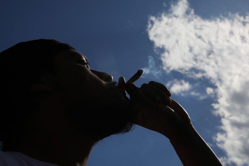 A person smokes cannabis in New York