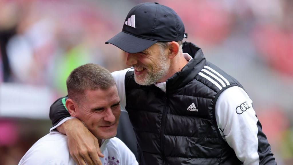 Anthony Barry and Thomas Tuchel embrace