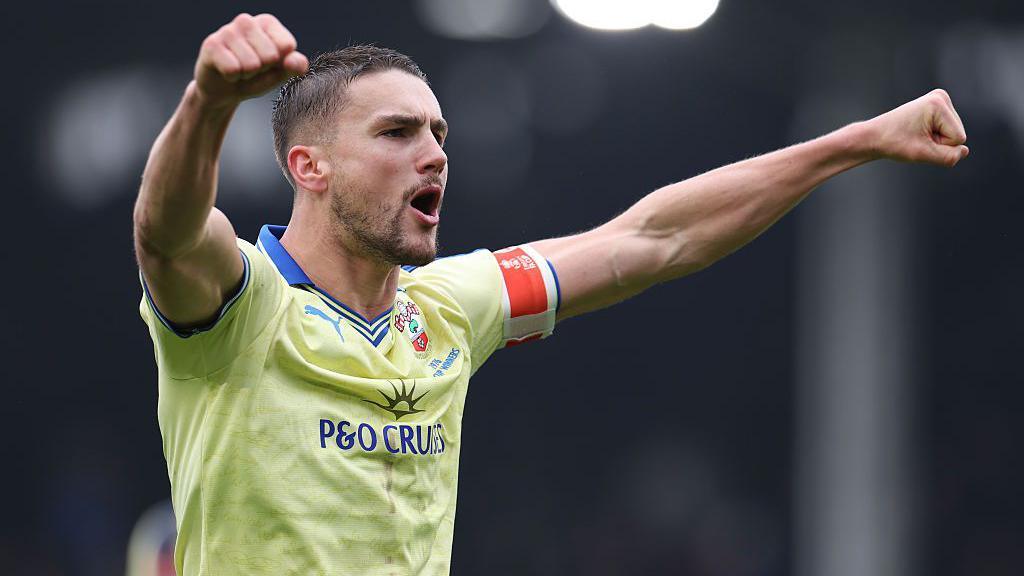 Taylor Harwood-Bellis celebrates after Southampton score at Fulham