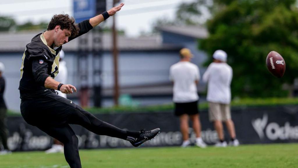 Charlie Smyth kicks a field goal in practice