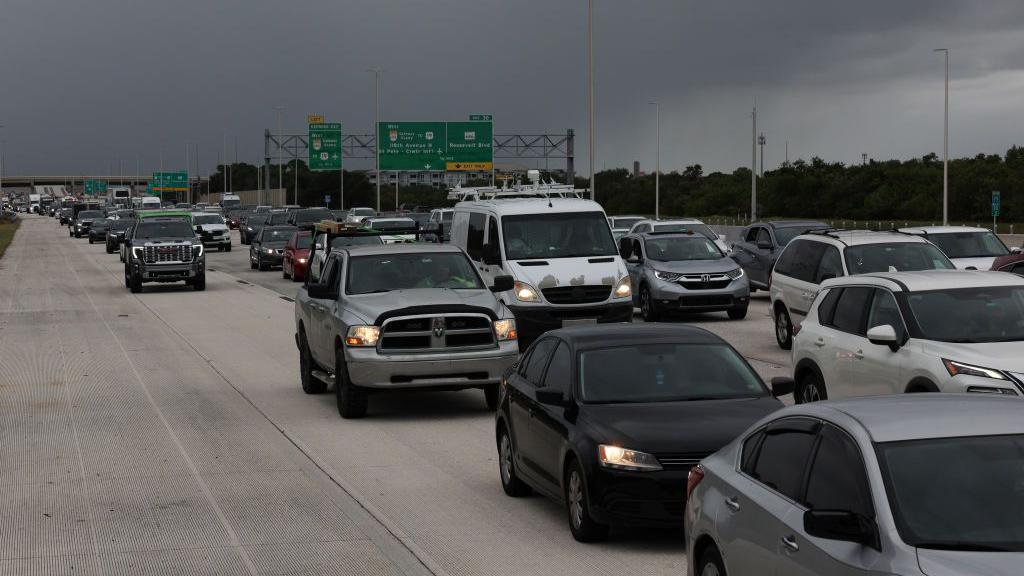 Queue of cars as thousands evacuate ahead of Hurricane Milton as it churns in the Gulf of Mexico on 7 October 2024, in St Petersburg, Florida