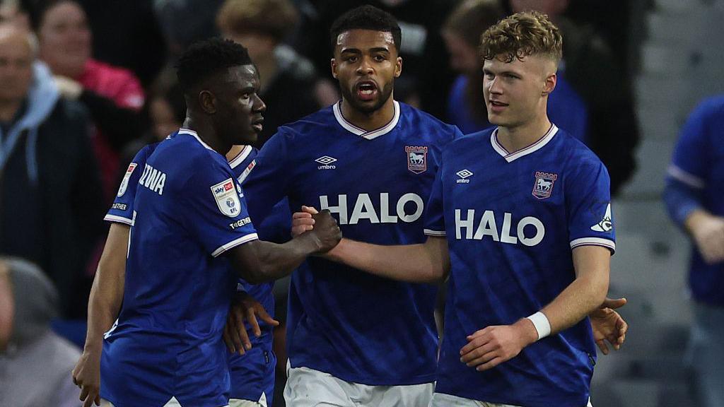Sindre Walle Egeli is congratulated by his Ipswich team-mates after scoring the first goal against Coventry