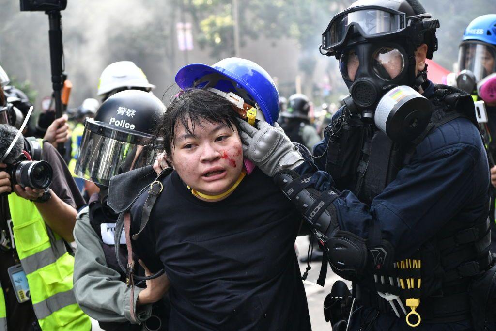 A pro-democracy protester is arrested during Hong Kong demonstrations in 2019