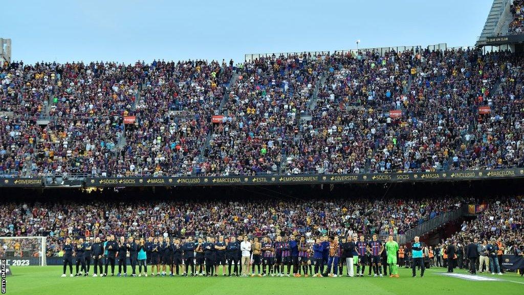 Barcelona players and staff applaud the home fans after their 3-0 La Liga win over Mallorca