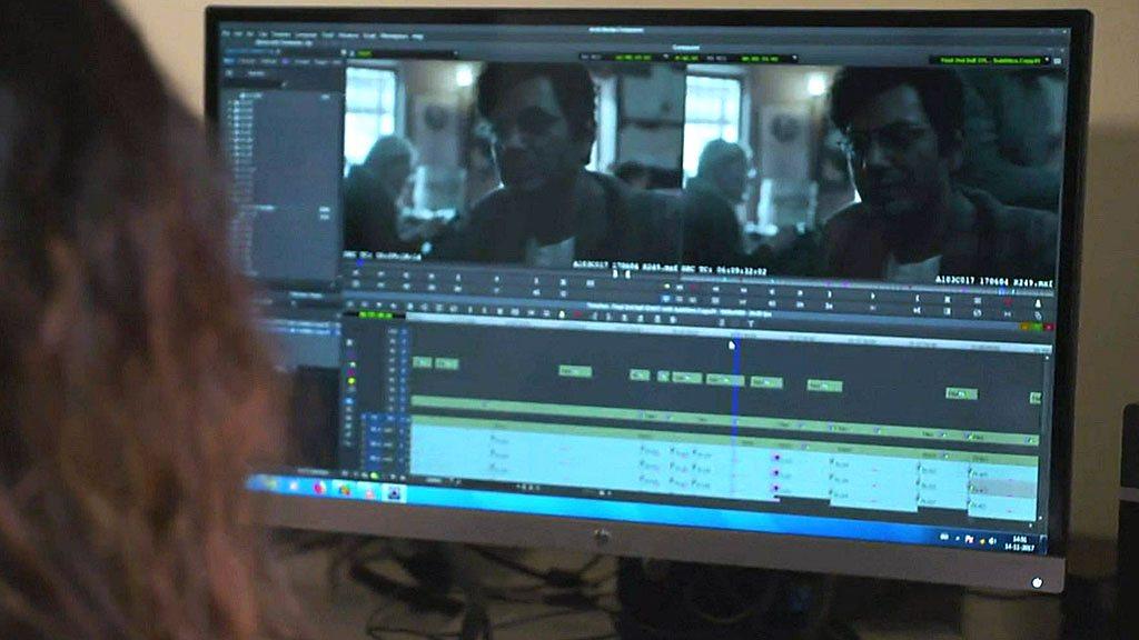 A film being edited in an edit suite