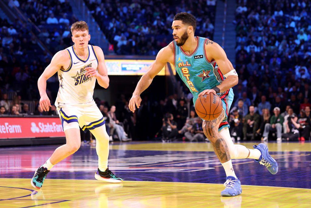 Jayson Tatum bounces the basketball