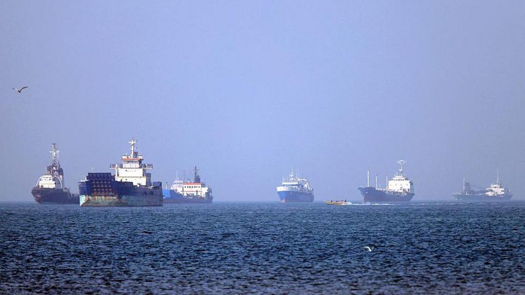  In this picture obtained from Iran's ISNA news agency on May 4, 2026, vessels are pictured anchored in the Strait of Hormuz off Bandar Abbas in southern Iran
