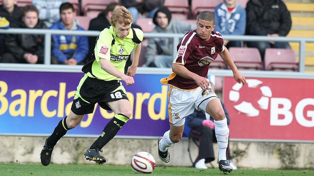 Chris Taylor of Oldham Athletic looks to move past Kyle Walker of Northampton Town during the Coca Cola League One Match between Northampton Town and Oldham Athletic at Sixfields Stadium on November 15, 2008