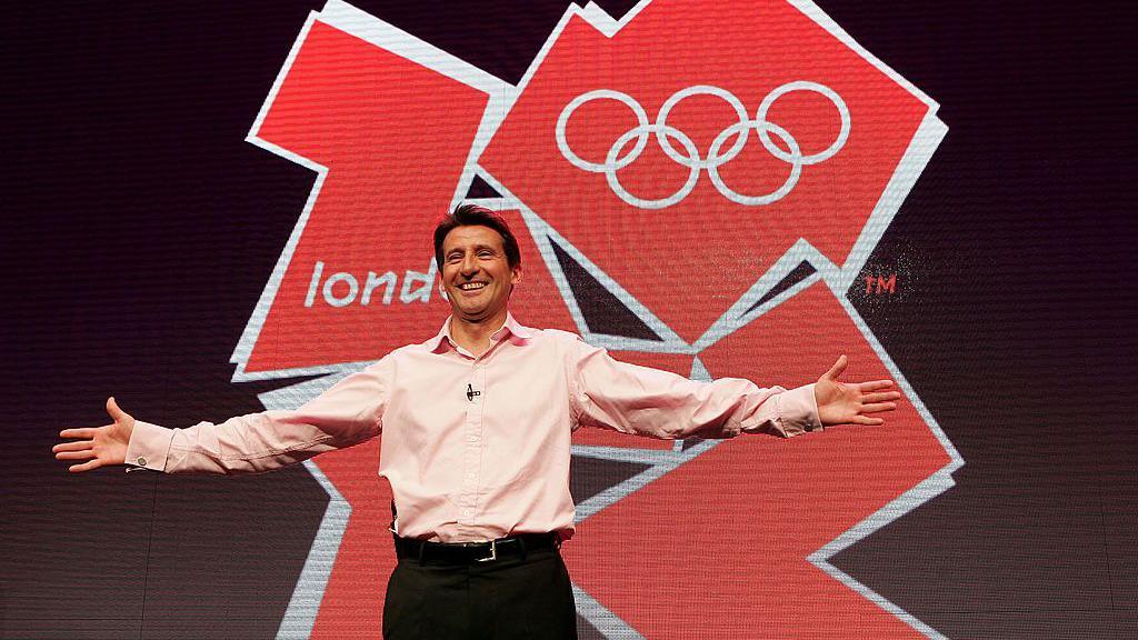 Lord Coe in front of the London 2012 logo in 2007