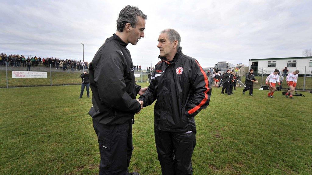 Donegal manager Jim McGuinness and former Tyrone manager Mickey Harte in 2011