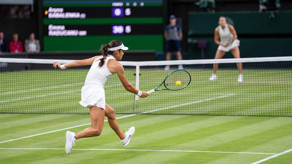Raducanu hitting the ball during the match.