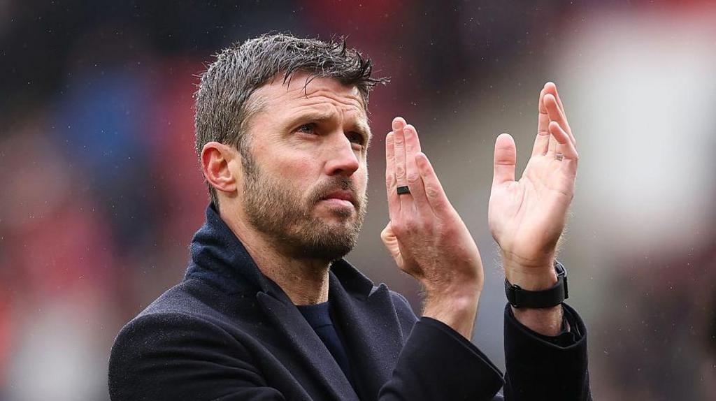 Michael Carrick applauding