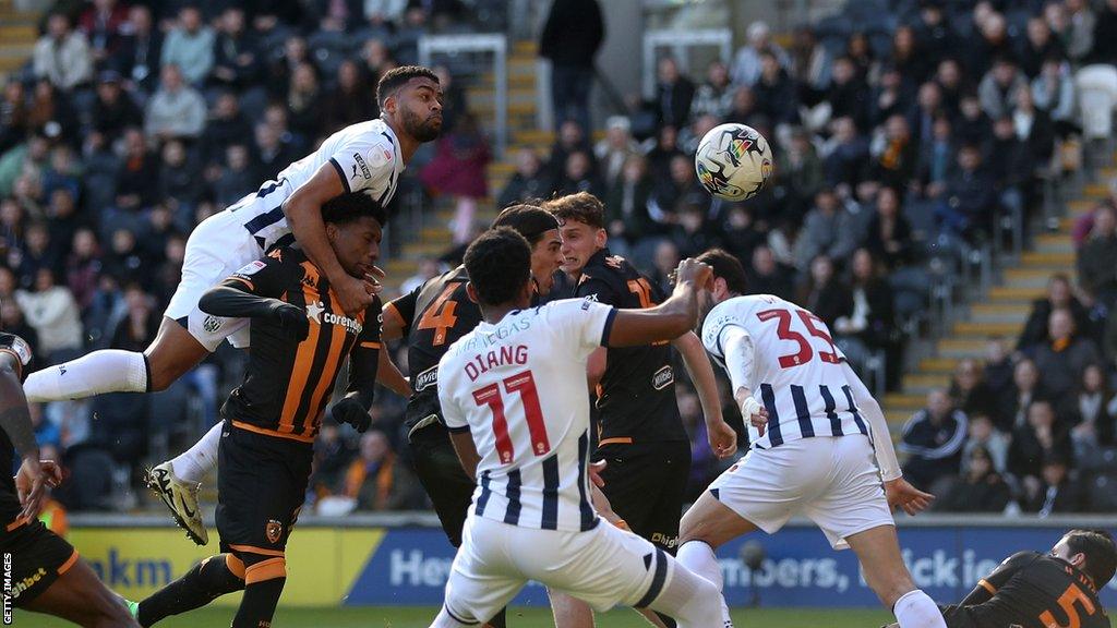 Darnell Furlong threatens in the air for West Brom against Hull City