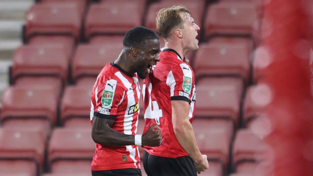 James Bree (right) celebrates scoring against Stoke