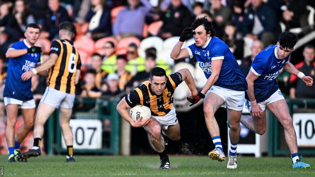 Crossmaglen defender Aaron Kernan takes a tumble in the Armagh club final on Sunday