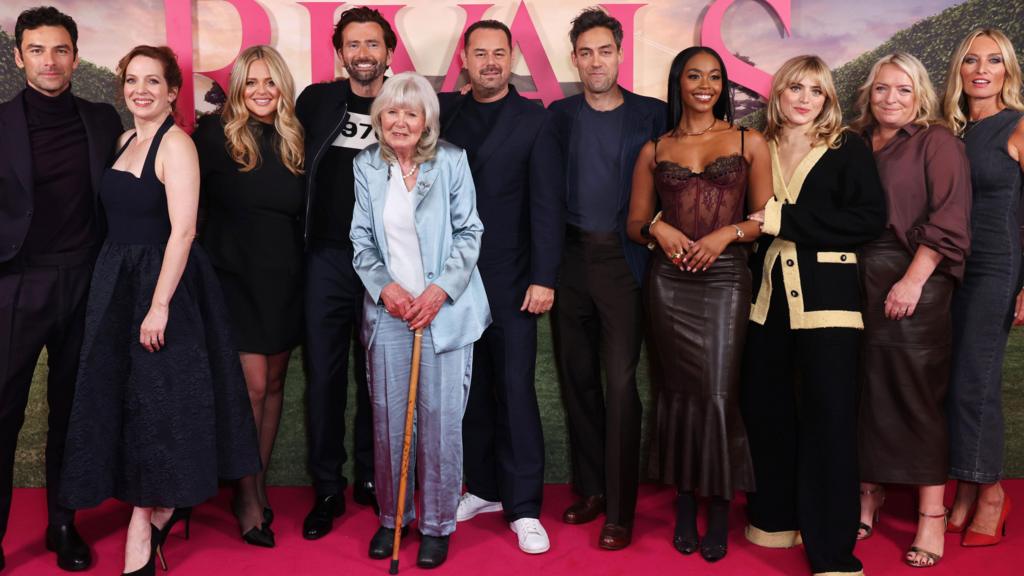 Aidan Turner, Katherine Parkinson, Emily Atack, David Tennant, Dame Jilly Cooper, Danny Dyer, Alex Hassell, Nafessa Williams, Bella Maclean, Claire Rushbrook and Victoria Smurfit attend a special UK screening of "Rivals" at The Ham Yard Hotel on September 17, 2024 in London, Englan