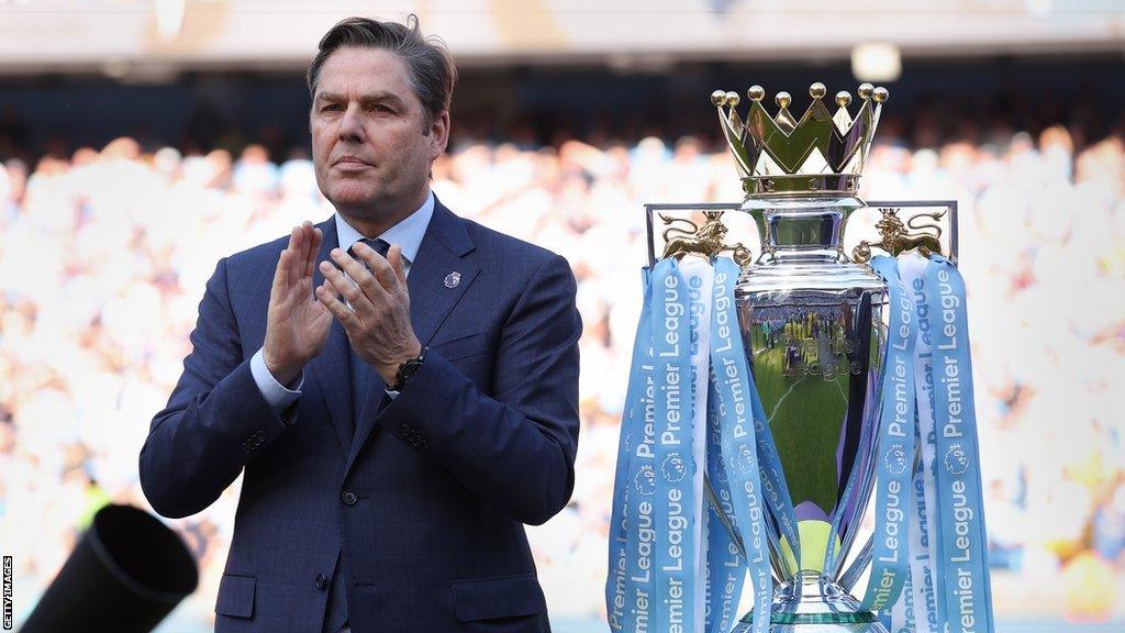 Premier League chief executive Richard Masters and the Premier League trophy