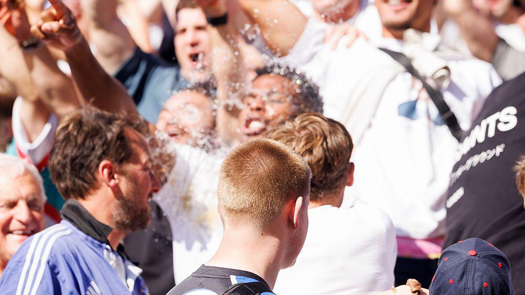 A departing Bath fan throws his drink at Feyi-Waboso