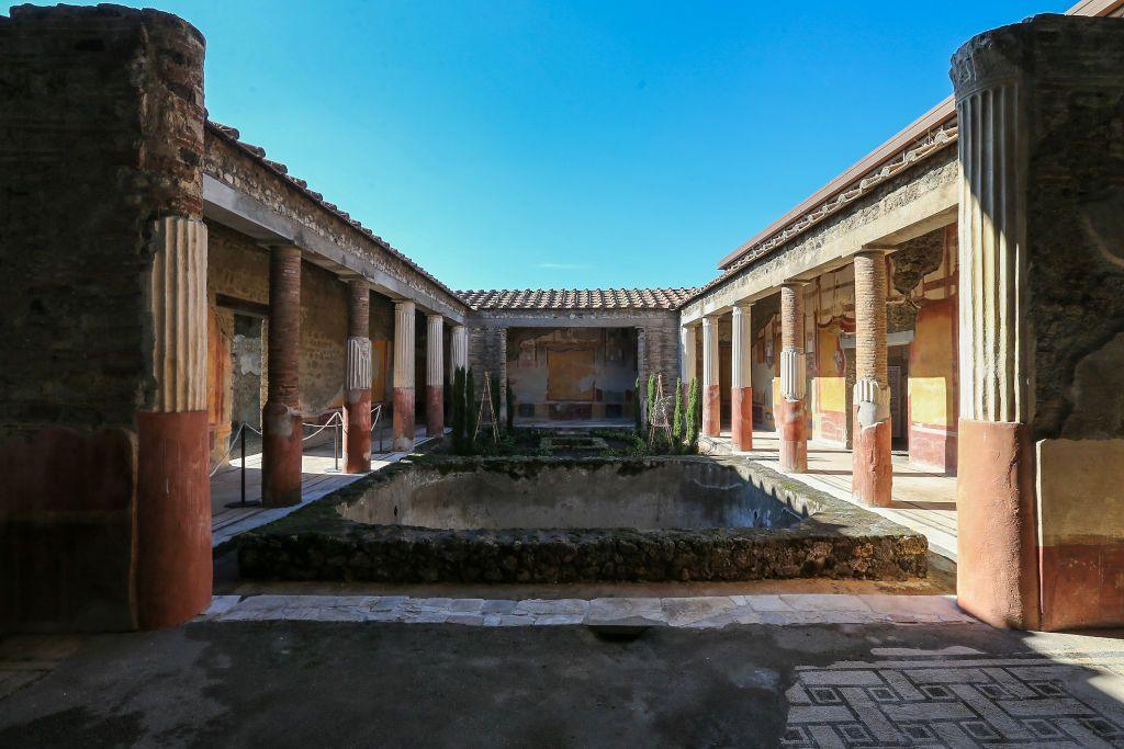 The Dioscuri house restorations within the Pompeii archaeological site.