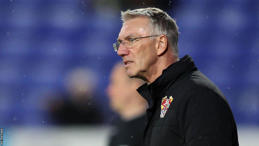 Nigel Adkins on the sidelines