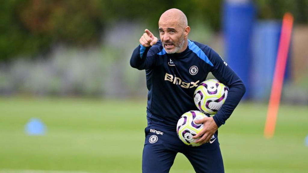 Enzo Maresca in action during Chelsea training.