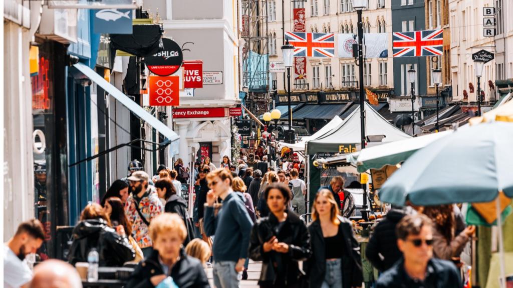 Shoppers at Portobello Road, Notting Hill, London