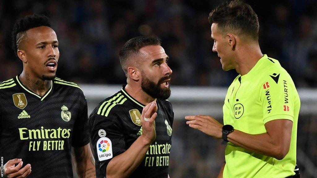 Real Madrid defender Dani Carvajal talks to the referee during his team's 2-0 defeat at Real Sociedad