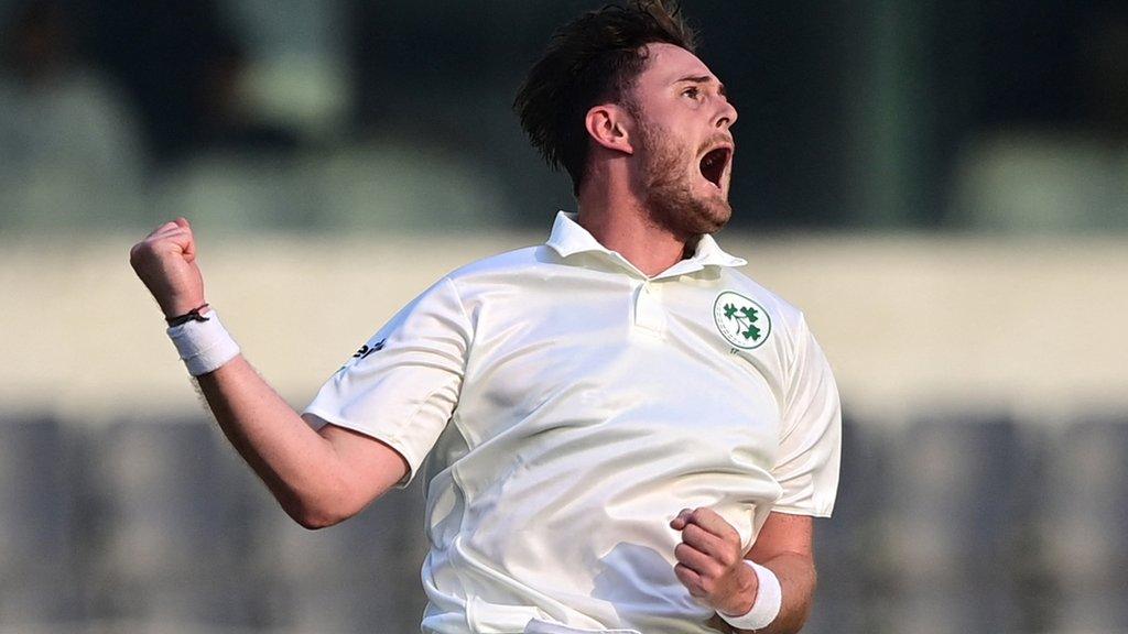 Ireland paceman Mark Adair celebrates taking the wicket of Bangladesh opener Najmul Hossain Shanto