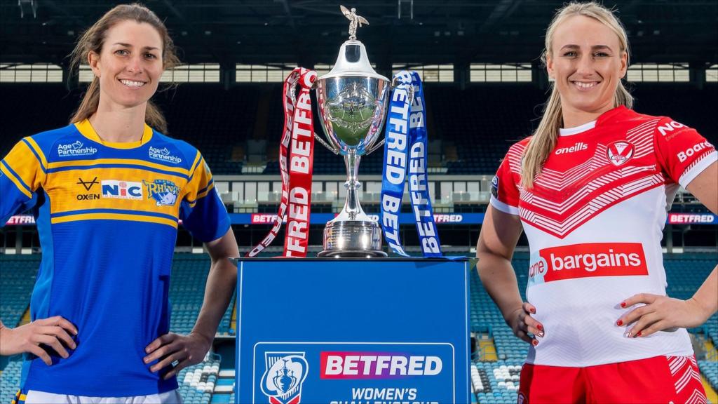 Courtney Winfield-Hill and Jodie Cunnginham pose with the Challenge Cup trophy