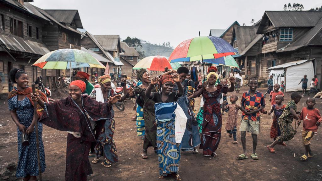 A group of women celebrate the birth of a child in Muheto in DR Congo - 2022