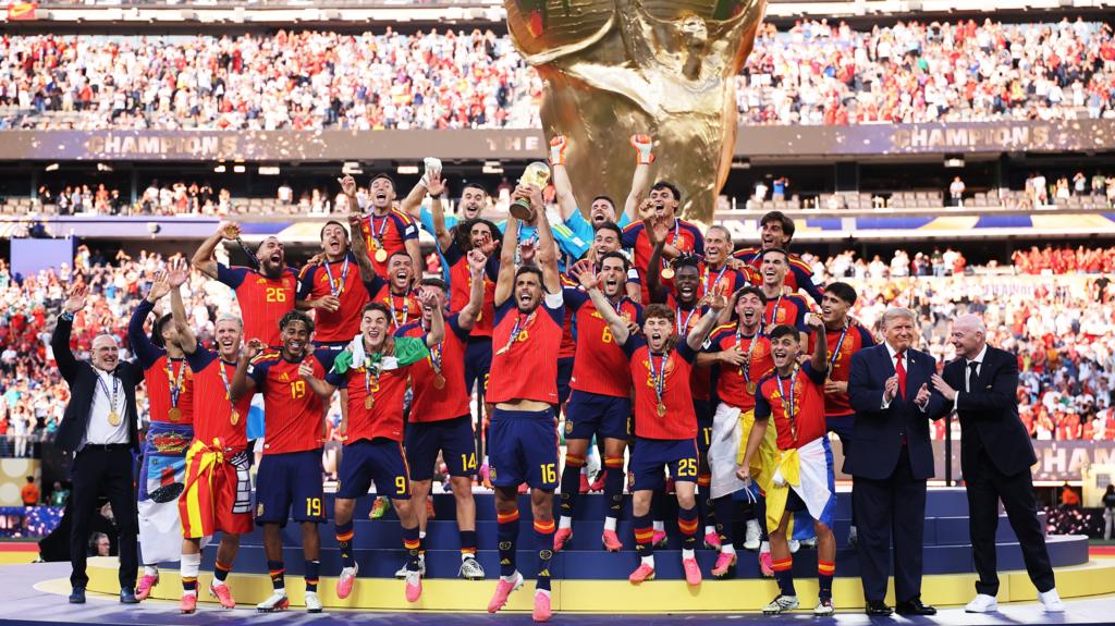 A wide shot of Spain's trophy lift with Fifa president Gianni Infantino and USA president Donald Trump on the right of the stage